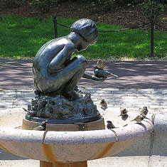 Sabian Symbol for Libra 22: A child giving birds a drink at a fountain